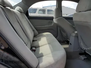 2006 Kia Spectra EX with VIN KNAFE121065348140, listed as a Copart auction lot 70874144 with 181,710 mi miles and Salvage Title. Bid and sale history available at carsss.com. Image 10.