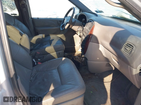 2001 Chrysler Town & Country with VIN 2C4GT54LX1R339931, listed as a IAAI auction lot 41374850 with 135,612 mi miles and . Bid and sale history available at DreamBid. Image 5.