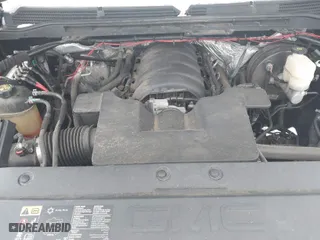 2015 GMC Sierra 1500 Denali with VIN 3GTU2WEC3FG396964, listed as a IAAI auction lot 41320507 with 127,987 mi miles. Bid and sale history available at carsss.com. Image 10.