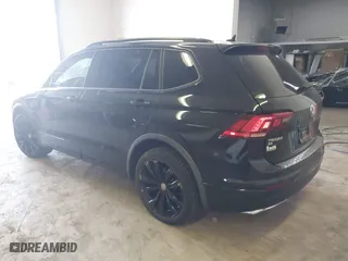 2021 Volkswagen Tiguan SE with VIN 3VV2B7AX1MM012587, listed as a IAAI auction lot 41653479 with 28,158 mi miles. Bid and sale history available at carsss.com. Image 3.