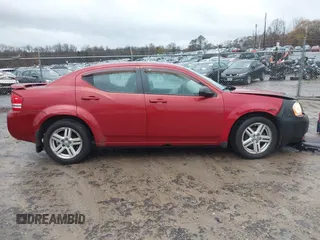 2009 Dodge Avenger SXT with VIN 1B3LC56BX9N523621, listed as a IAAI auction lot 41068673 with 174,055 mi miles. Bid and sale history available at carsss.com. Image 13.