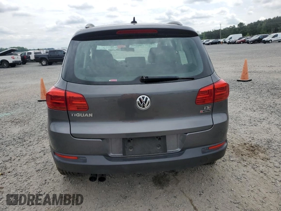 2017 Volkswagen Tiguan S с VIN WVGBV7AX8HK038781, выставлен на аукционе Copart как лот 53607475 с пробегом 71 419 миль миль и Списание • Salvage title. История ставок и продаж доступна на DreamBid. Изображение 6.