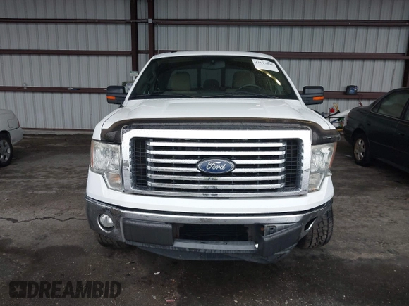 2011 Ford F-150 XL with VIN 1FTFX1CT6BFC10586, listed as a IAAI auction lot 41613825 with 124,854 mi miles. Bid and sale history available at carsss.com. Image 12.