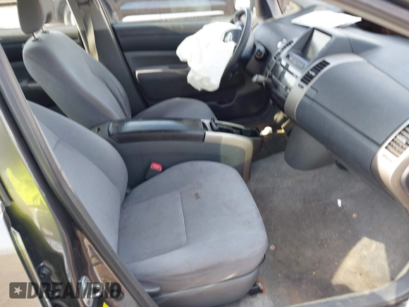 2007 Toyota Prius z VIN JTDKB20U273203420, wystawiony jako IAAI lot #42120951 z przebiegiem 261 452 mil mil oraz . Historia ofert i sprzedaży dostępna na DreamBid. Obrazek 5.