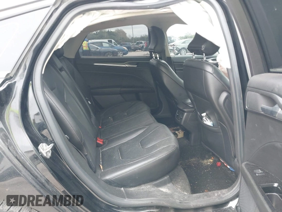 2016 Ford Fusion Titanium with VIN 3FA6P0D98GR355593, listed as a IAAI auction lot 41625532 with 97,638 mi miles and . Bid and sale history available at DreamBid. Image 8.