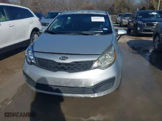 2013 Kia Rio LX with VIN KNADM4A30D6153516, listed as a IAAI auction lot 41646357 with 127,435 mi miles. Bid and sale history available at carsss.com. Image 6.