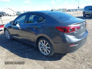 2014 Mazda 3 S Touring with VIN JM1BM1V37E1144331, listed as a IAAI auction lot 41880673 with 102,963 mi miles and . Bid and sale history available at DreamBid. Image 3.