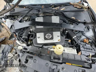 2010 Nissan 370Z z VIN JN1AZ4FH0AM301315, wystawiony jako Copart lot #86204894 z przebiegiem Nie podano mil oraz Szkody całkowita. Historia ofert i sprzedaży dostępna na DreamBid. Obrazek 11.