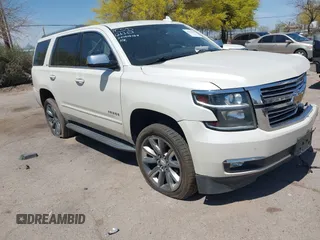 2015 Chevrolet Tahoe LTZ z VIN 1GNSKCKC9FR626301, wystawiony jako IAAI lot #42001007 z przebiegiem 152 542 mil mil oraz . Historia ofert i sprzedaży dostępna na DreamBid. Obrazek 1.