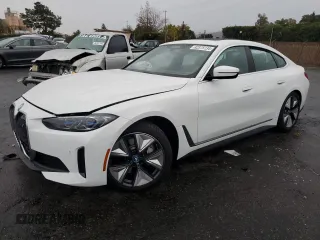 2024 BMW i4 xDrive40 with VIN WBY83FB09RFT27001, listed as a Copart auction lot 82375134 with 690 mi miles and Salvage Title. Bid and sale history available at carsss.com. Image 1.