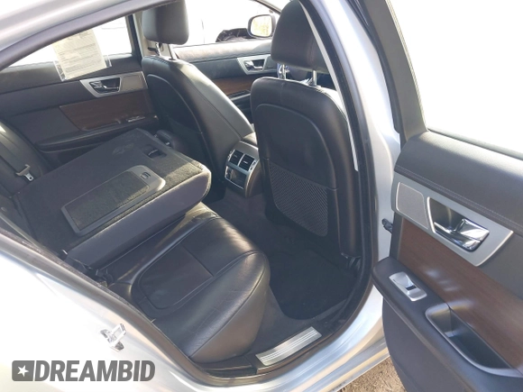 2013 Jaguar XF V6 SC with VIN SAJWJ0EF6D8S81203, listed as a IAAI auction lot 40783947 with 77,727 mi miles. Bid and sale history available at carsss.com. Image 8.