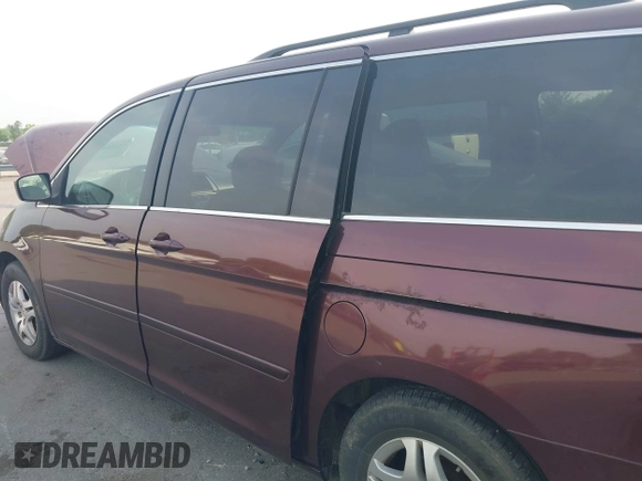 2007 Honda Odyssey EX-L with VIN 5FNRL387X7B140635, listed as a IAAI auction lot 42036807 with 292,774 mi miles. Bid and sale history available at carsss.com. Image 6.