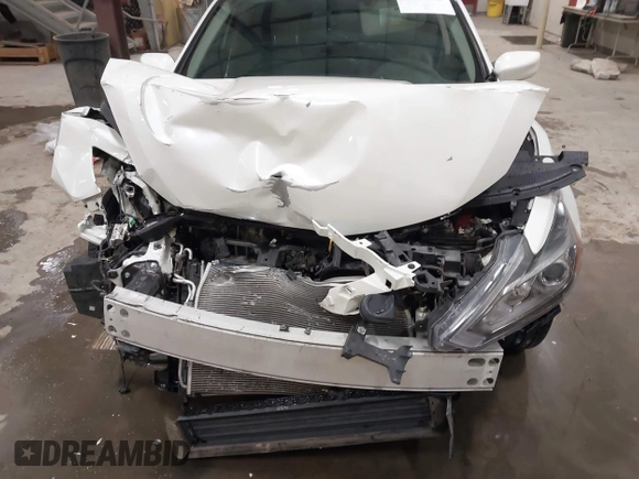 2018 Nissan Altima SV with VIN 1N4AL3AP9JC271718, listed as a IAAI auction lot 41787242 with 73,523 mi miles and . Bid and sale history available at carsss.com. Image 6.