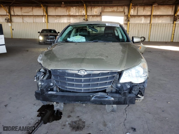 2010 Chrysler Sebring Limited with VIN 1C3CC5FD2AN190727, listed as a Copart auction lot 77809954 with 122,455 mi miles and Salvage Title. Bid and sale history available at carsss.com. Image 5.