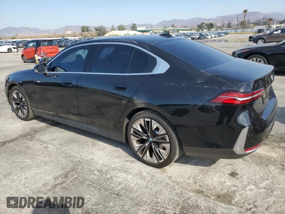 2024 BMW 5 Series 530i with VIN WBA43FJ09RCS15203, listed as a Copart auction lot 42549495 with 22,920 mi miles and Salvage title. Bid and sale history available at DreamBid. Image 2.