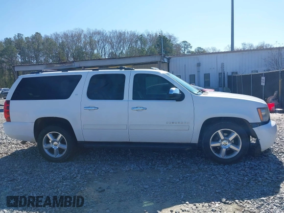 2011 Chevrolet Suburban LT with VIN 1GNSCJE05BR357775, listed as a IAAI auction lot 41807667 with 327,313 mi miles. Bid and sale history available at carsss.com. Image 13.