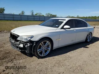 2014 BMW 7 Series 740Li with VIN WBAYE4C57ED138408, listed as a Copart auction lot 80553304 with 154,690 mi miles and Salvage Title. Bid and sale history available at carsss.com. Image 1.