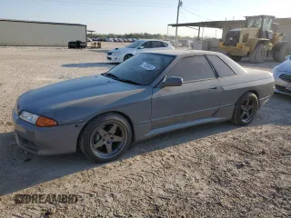 1992 Nissan Skyline z VIN HNR32035831, wystawiony jako Copart lot #74228974 z przebiegiem 49 082 mil mil oraz Szkoda całkowita • Salvage title. Historia ofert i sprzedaży dostępna na DreamBid. Obrazek 2.