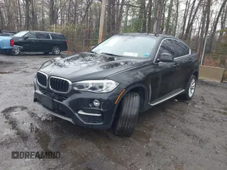 2015 BMW X6 xDrive35i with VIN 5UXKU2C53F0N76799, listed as a IAAI auction lot 41946628 with 173,607 mi miles. Bid and sale history available at carsss.com. Image 2.