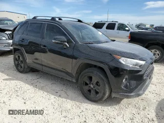 2019 Toyota RAV4 XLE with VIN JTMW1RFV5KD500679, listed as a Copart auction lot 48762575 with 105,403 mi miles and Salvage Title. Bid and sale history available at carsss.com. Image 4.