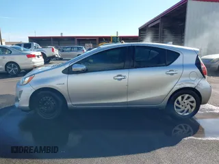 2015 Toyota Prius One z VIN JTDKDTB36F1578113, wystawiony jako IAAI lot #41302191 z przebiegiem 124 610 mil mil oraz . Historia ofert i sprzedaży dostępna na DreamBid. Obrazek 14.