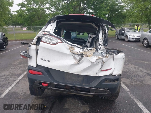 2016 Jeep Cherokee Trailhawk with VIN 1C4PJMBS4GW179121, listed as a IAAI auction lot 42516635 with 110,056 mi miles and . Bid and sale history available at DreamBid. Image 16.