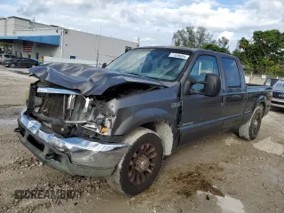 2002 Ford F-250 XL with VIN 1FTNW20F12EB93947, listed as a Copart auction lot 77836054 with 322,030 mi miles and Salvage Title. Bid and sale history available at DreamBid. Image 1.