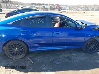 2020 Honda Civic Si with VIN 2HGFC1E59LH707904, listed as a IAAI auction lot 41621372 with 112,077 mi miles and . Bid and sale history available at DreamBid. Image 14.