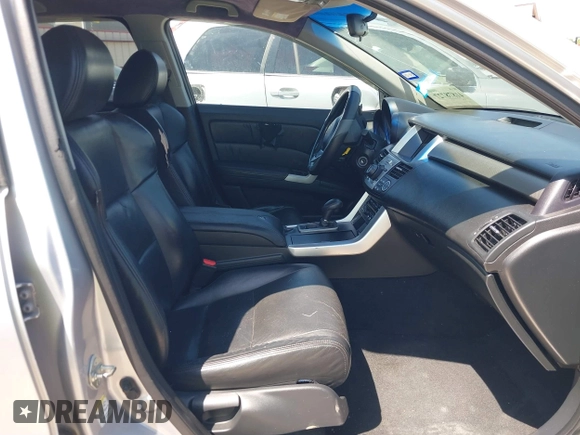 2007 Acura RDX Tech Pkg with VIN 5J8TB18587A010200, listed as a IAAI auction lot 41878727 with 168,624 mi miles. Bid and sale history available at carsss.com. Image 5.