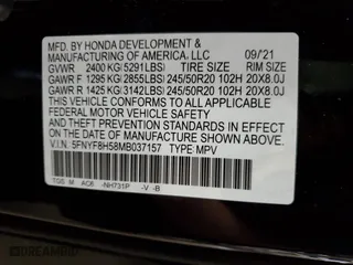 2021 Honda Passport EX-L with VIN 5FNYF8H58MB037157, listed as a Copart auction lot 58828074 with 25,890 mi miles and Salvage Title. Bid and sale history available at carsss.com. Image 14.