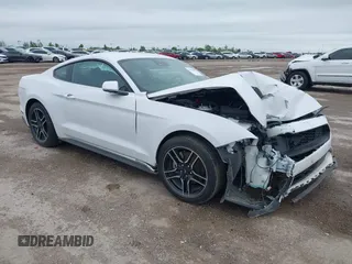 2022 Ford Mustang EcoBoost with VIN 1FA6P8THXN5136044, listed as a IAAI auction lot 41929087 with 46,896 mi miles and . Bid and sale history available at DreamBid. Image 1.