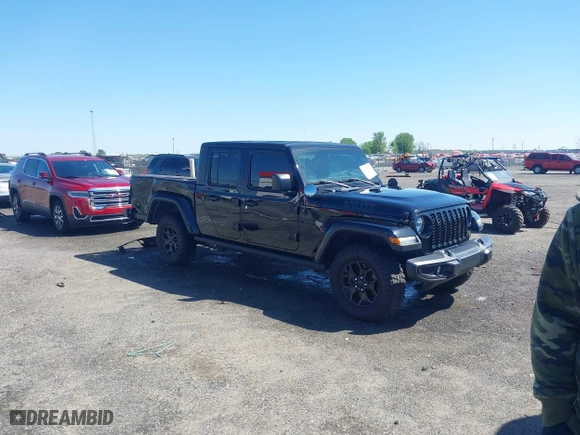 2023 Jeep Gladiator Freedom with VIN 1C6HJTAG1PL526229, listed as a IAAI auction lot 41972084 with 26,021 mi miles. Bid and sale history available at carsss.com. Image 1.