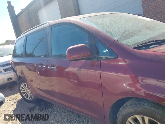 2015 Toyota Sienna XLE with VIN 5TDYK3DC3FS666438, listed as a IAAI auction lot 42117980 with 121,084 mi miles and . Bid and sale history available at DreamBid. Image 13.