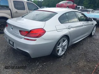 2014 BMW 6 Series 650i z VIN WBA6B2C58ED129639, wystawiony jako IAAI lot #42171786 z przebiegiem 108 677 mil mil oraz . Historia ofert i sprzedaży dostępna na DreamBid. Obrazek 4.