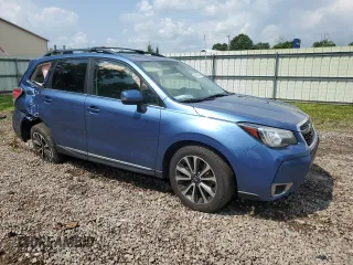 2017 Subaru Forester Touring with VIN JF2SJGWC9HH574837, listed as a Copart auction lot 60128065 with Not provided miles and Salvage title. Bid and sale history available at DreamBid. Image 4.