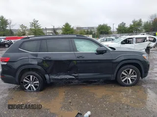 2021 Volkswagen Atlas SE z VIN 1V2DP2CA8MC524593, wystawiony jako IAAI lot #42006866 z przebiegiem 60 419 mil mil oraz . Historia ofert i sprzedaży dostępna na DreamBid. Obrazek 13.