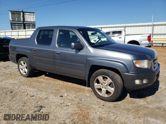 2011 Honda Ridgeline RTL with VIN 5FPYK1F51BB007802, listed as a Copart auction lot 63261935 with 397,803 mi miles and Clean title. Bid and sale history available at DreamBid. Image 4.
