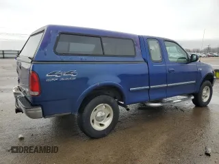 1997 Ford F-150 XL with VIN 1FTDX18W3VKC25911, listed as a Copart auction lot 44074305 with 184,409 mi miles and Salvage Title. Bid and sale history available at carsss.com. Image 3.