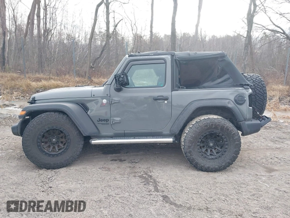 2021 Jeep Wrangler Sport S with VIN 1C4GJXAN9MW768559, listed as a IAAI auction lot 41238254 with 18,191 mi miles and . Bid and sale history available at DreamBid. Image 14.