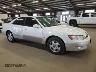 1999 Lexus ES 300 Luxury Sport Sdn with VIN JT8BF28G3X0205731, listed as a Copart auction lot 54057085 with 146,207 mi miles and Salvage Title. Bid and sale history available at carsss.com. Image 4.