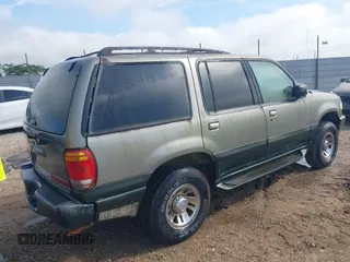 1999 Mercury Mountaineer with VIN 4M2ZU52E1XUJ26317, listed as a IAAI auction lot 42606083 with 126,554 mi miles and . Bid and sale history available at DreamBid. Image 4.