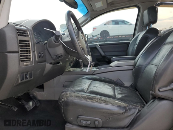 2004 Nissan Titan LE with VIN 1N6AA07A74N516071, listed as a Copart auction lot 87472284 with 140,011 mi miles and Salvage Title. Bid and sale history available at DreamBid. Image 7.