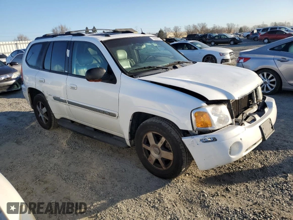2005 GMC Envoy SLE с VIN 1GKDS13S852261326, выставлен на аукционе Copart как лот 42650025 с пробегом 210 485 миль миль и Списание • Salvage title. История ставок и продаж доступна на DreamBid. Изображение 4.