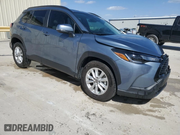 2023 Toyota Corolla Cross LE with VIN 7MUBAAAG1PV059515, listed as a Copart auction lot 49926985 with 30,673 mi miles and Clean title. Bid and sale history available at DreamBid. Image 4.