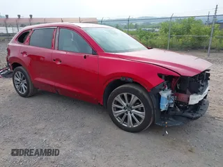 2021 Mazda CX-9 Signature with VIN JM3TCBEY2M0509874, listed as a IAAI auction lot 42492202 with 69,153 mi miles and . Bid and sale history available at DreamBid. Image 1.