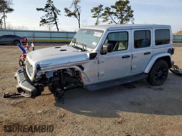 2024 Jeep Wrangler Sahara with VIN 1C4RJXP60RW128448, listed as a Copart auction lot 48658135 with 5,879 mi miles and Salvage Title. Bid and sale history available at DreamBid. Image 1.