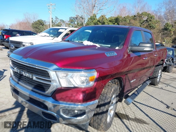 2019 Ram 1500 Big Horn/Lone Star with VIN 1C6SRFFT8KN870451, listed as a IAAI auction lot 41639815 with 100,924 mi miles. Bid and sale history available at carsss.com. Image 17.