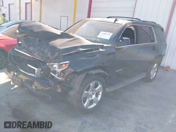 2015 Chevrolet Tahoe LT with VIN 1GNSCBKC6FR188764, listed as a IAAI auction lot 40267671 with 86,663 mi miles and . Bid and sale history available at DreamBid. Image 17.