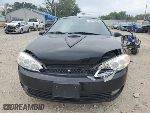 2002 Mercury Cougar z VIN 1ZWFT61L525609449, wystawiony jako Copart lot #72945474 z przebiegiem 156 633 mil mil oraz Szkoda całkowita • Salvage title. Historia ofert i sprzedaży dostępna na DreamBid. Obrazek 5.