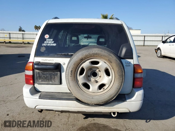 2002 Suzuki XL7 Standard z VIN JS3TX92VX24118298, wystawiony jako Copart lot #42781415 z przebiegiem 312 010 mil mil oraz Szkoda całkowita • Salvage title. Historia ofert i sprzedaży dostępna na DreamBid. Obrazek 6.